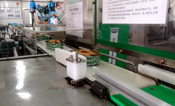 1675750210431737.jpg canned food checkweigher from DaHang Automation.jpg